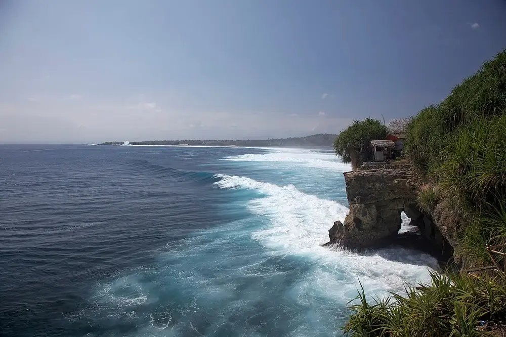 Cliff jump, then a Bintang at the bar — Mahana Point, Where to ride from Nusa Ceningan